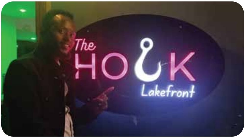 Backlit lakefront signage — The Hook Lakefront