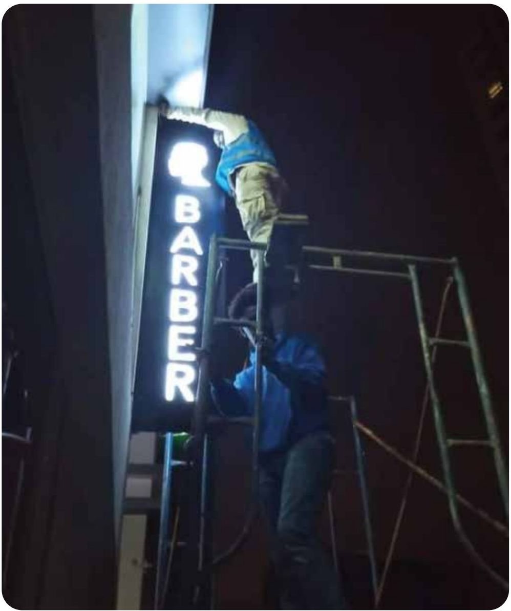 On-site channel letter install — Barber Shop, Nairobi
