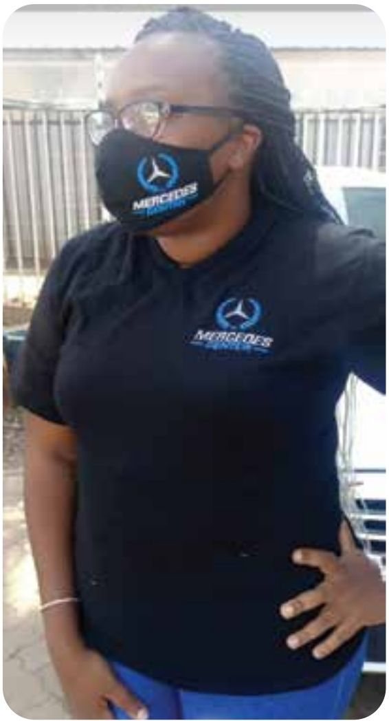 Embroidered staff polos — Mercedes Center Ltd